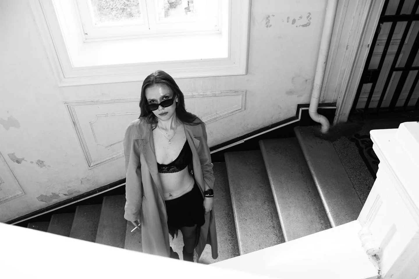 A trench coat on the stairs